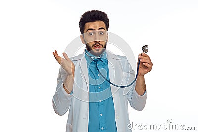 male doctor otoscope hospital treatment therapist light background Stock Photo