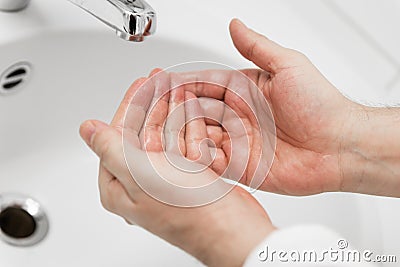 Doctor is washing his hands Stock Photo