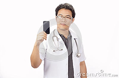 Male doctor in white coat is using a modern smartp Stock Photo