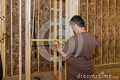 Male electrician technician inspector check inspect electrical system electrician holding tablet PC Stock Photo