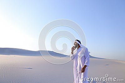 Male Emirati designer completes site survey for construction sit Stock Photo