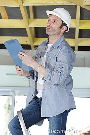 male employee with clipboard Stock Photo