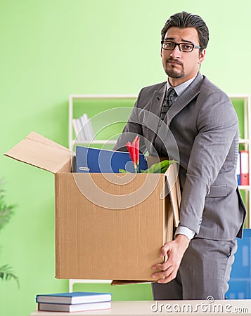 Male employee collecting his stuff after redundancy Stock Photo