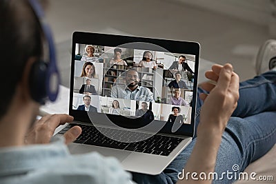 Male employee have group video call with colleagues Stock Photo