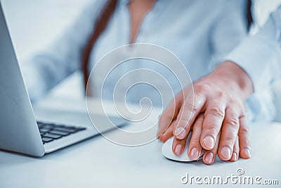 Male employee putting his hand over his workmate hand Stock Photo