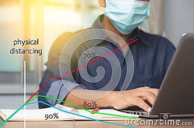 Male employee wearing a health mask Preventing corona virus infection covid-19, reading social distancing or physical distancing Stock Photo