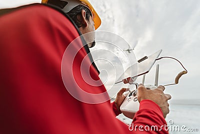 Male engineer doing inspection using drone Stock Photo