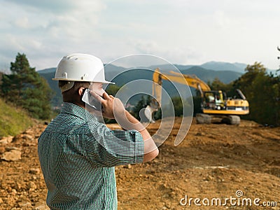 Male engineer talking on the phone Stock Photo