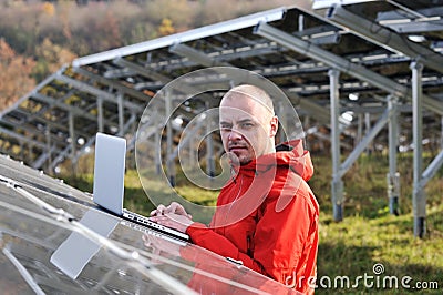 Male engineer using laptop, Stock Photo