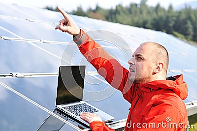 Male engineer using laptop, Stock Photo