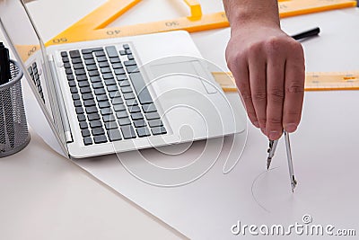 The male engineer working on drawings and blueprints Stock Photo