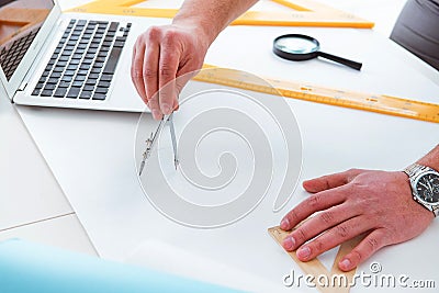 The male engineer working on drawings and blueprints Stock Photo