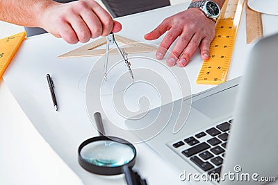 The male engineer working on drawings and blueprints Stock Photo