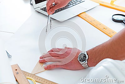 The male engineer working on drawings and blueprints Stock Photo