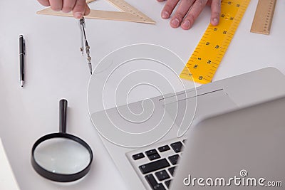 The male engineer working on drawings and blueprints Stock Photo