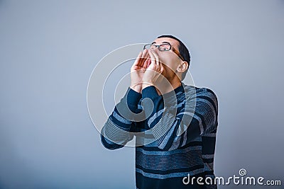 Male of European appearance brunet screams put Stock Photo