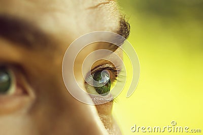 Male eye with dotty lens Stock Photo