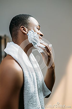 male facial care skin treatment man shaving foam Stock Photo