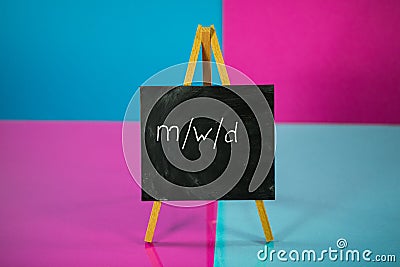 Male, female, divers, no matter, the main thing is healthy, chalkboard with gifts in pink and blue packaging Stock Photo