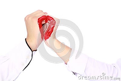 Male and female hand are shaping heart Stock Photo