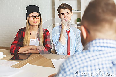 Male and female interviewed for a job Stock Photo