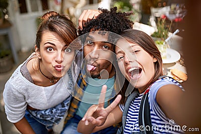 Male with female makes funny face Stock Photo