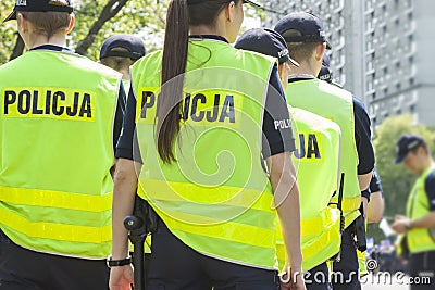 Male and Female Police Officers Editorial Stock Photo