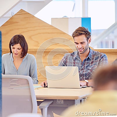Male and female students busy studying hard together Stock Photo