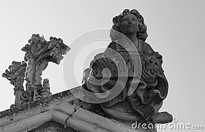 Male figure with christ on the cross behind Stock Photo