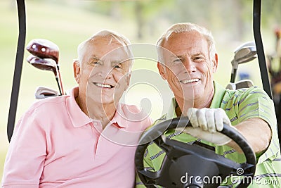 Male Friends Enjoying A Game Of Golf Stock Photo