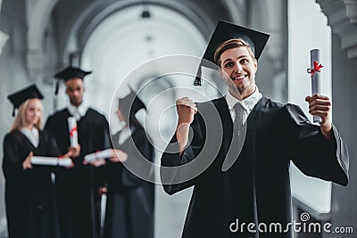 Male graduate in university Stock Photo