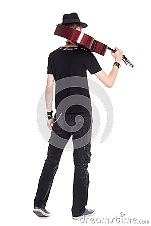 Male guitarist with guitar rear view Stock Photo