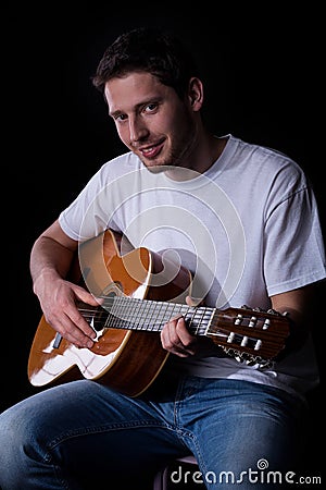 Male guitarist with guitar Stock Photo