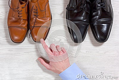 Choosing Which Shoes to Wear Stock Photo