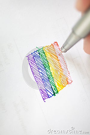 A male hand is drawing an LGBT symbol of homosexuality Stock Photo