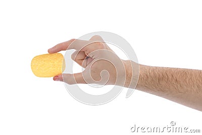 Male hand holding potato chip Stock Photo