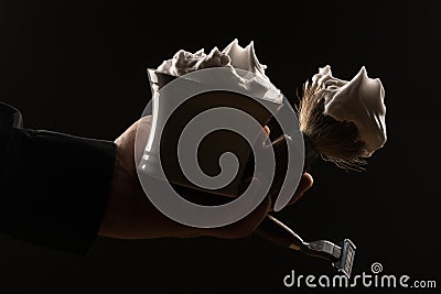 Male hand holding shaving equipment Stock Photo