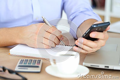 Male hand holding silver pen Stock Photo