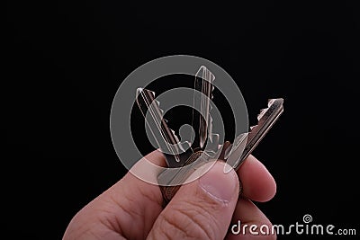 Hand with three keys Stock Photo