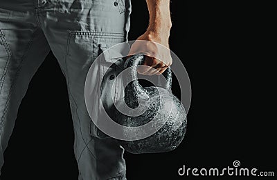 Male hand with kettlebell Stock Photo