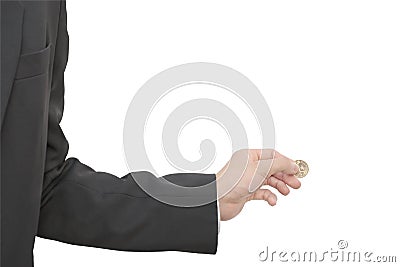 Male hand pinching dollar coin Stock Photo