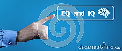 Male hand pointing Eq and Iq word Stock Photo