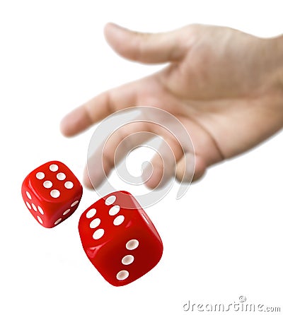 Male hand rolling red dice Stock Photo