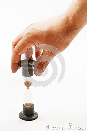 Male hand with sand glass Stock Photo