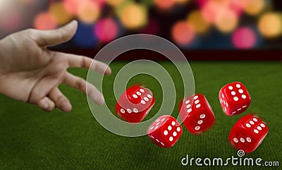 Male hand throwing dice Stock Photo