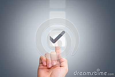 Male Hand Touching Button and Ticking Check Box Stock Photo