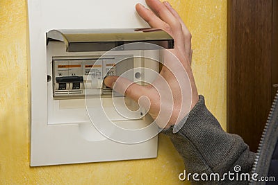 Male hand using an electronic control panel Stock Photo