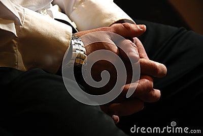 Male hands of a businessman in a castle on his knees. Waiting for a meeting, recruitment, recruiting, job seeker. Business concept Stock Photo