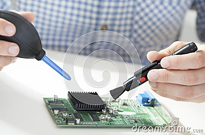 Male hands cleaning processor Stock Photo