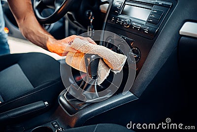 Male hands cleans car interior on carwash station Stock Photo